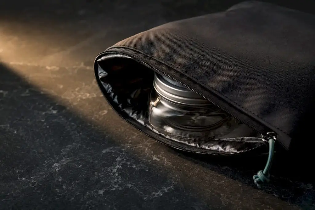 Jar inside carbon-lined odor-proof bag