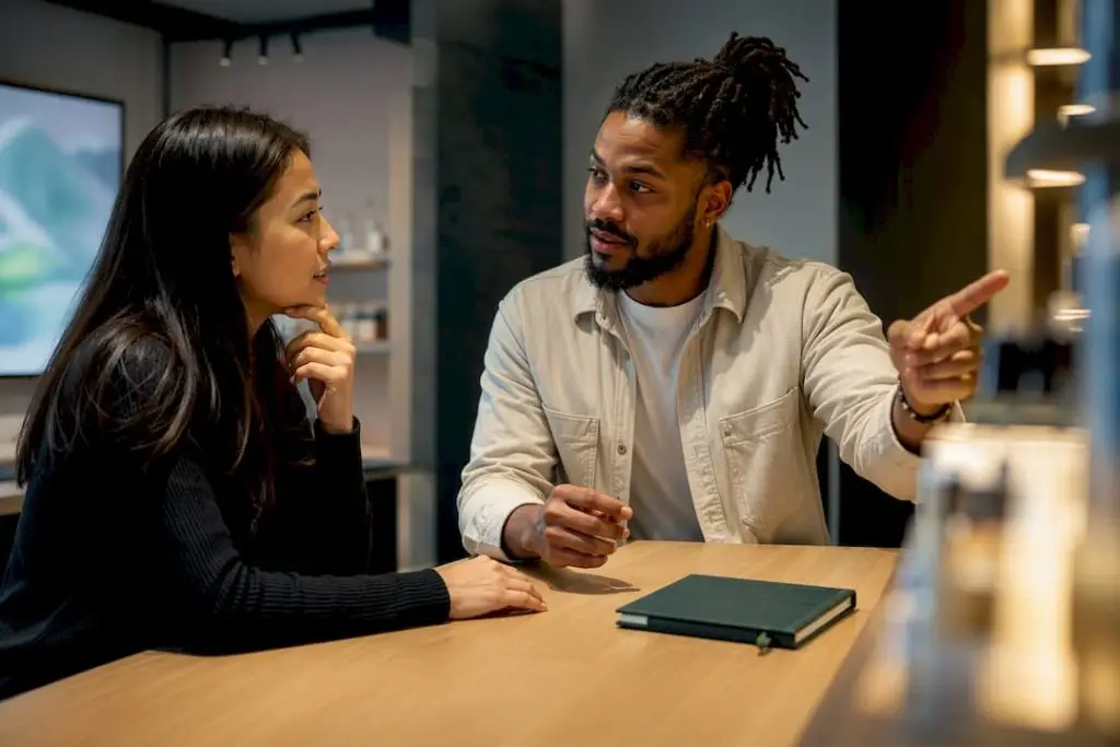 Beginner speaking with attentive dispensary budtender